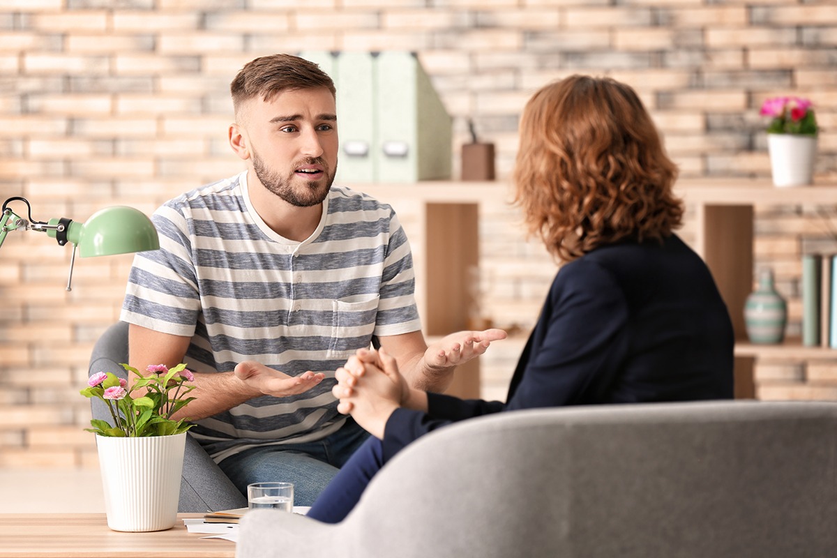 Female psychologist working with patient in office