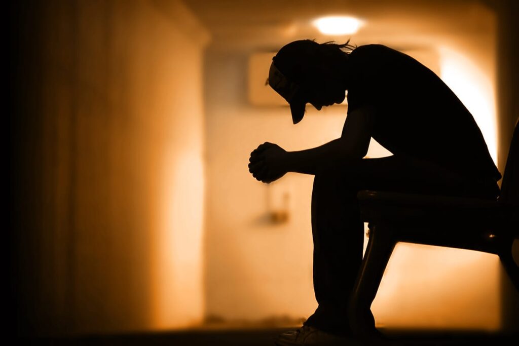 Man thinking about heroin vs cocaine