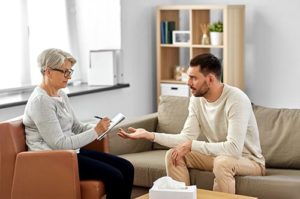 Therapist and patient speaking at a hydrocodone addiction treatment center in TX