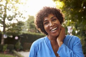 Smiling woman who has enjoyed her women's addiction treatment centers in TX