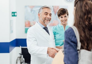 Doctor speaking to patient a a cognitive behavioral therapy program