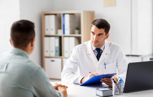 a doctor and a patient at a Mens Drug Rehab Center TX