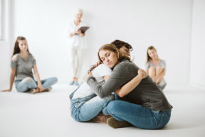 women hugging at a Womens Addiction Treatment Center TX