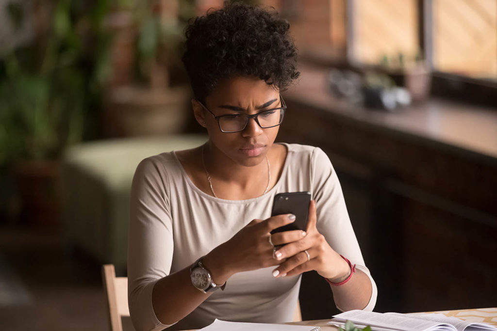 woman learning more about drinking and social media