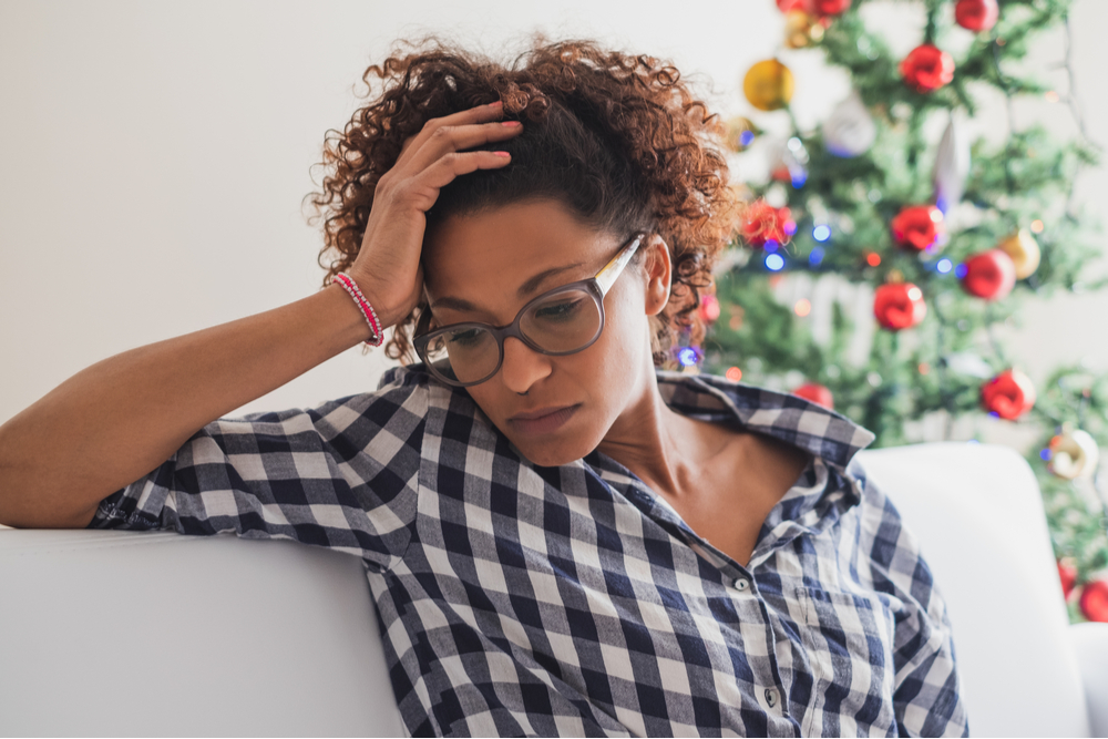 Pensive woman looking to start treatment in December