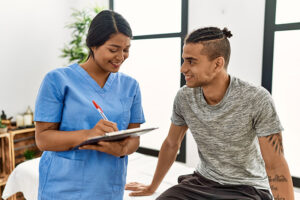 a patient does an intake with a medical professional in an alcohol detox center