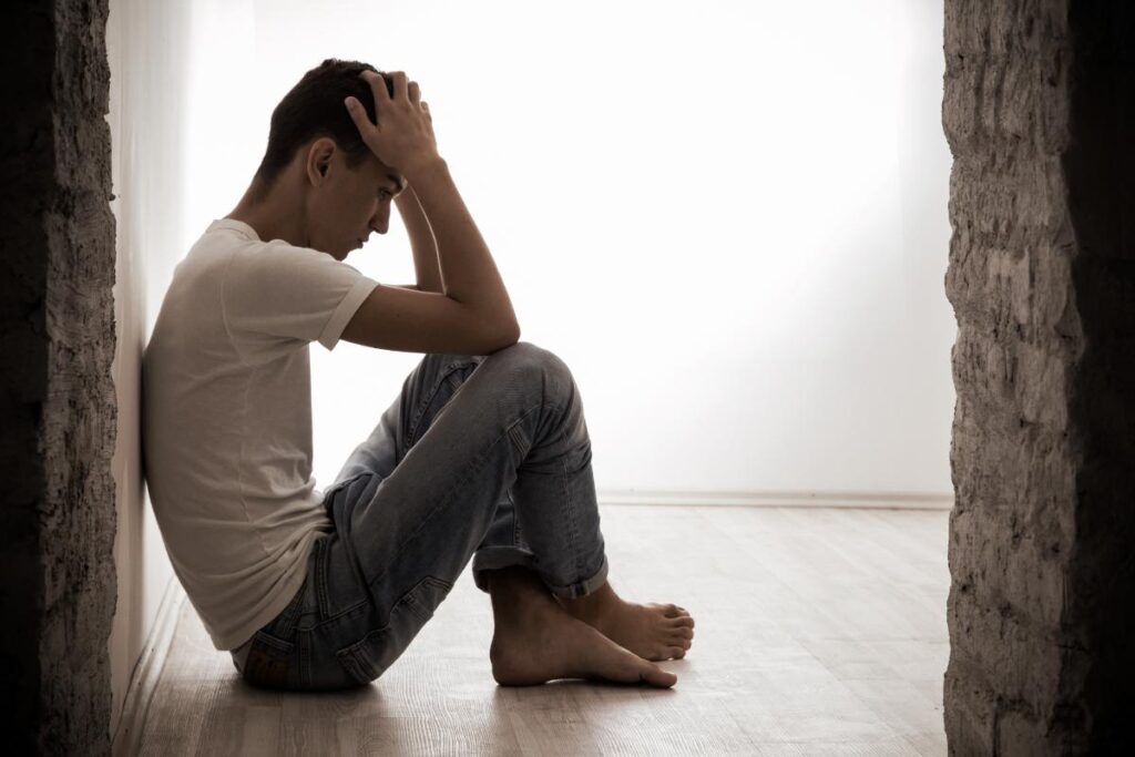 a young man struggles through suboxone withdrawal symptoms
