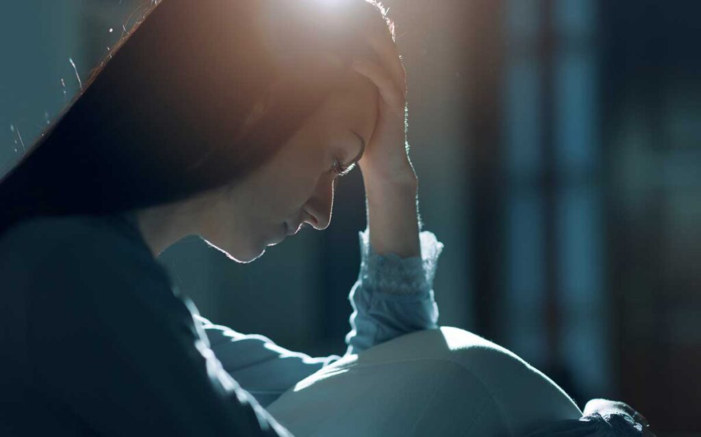 Person thinking about examples of depressants