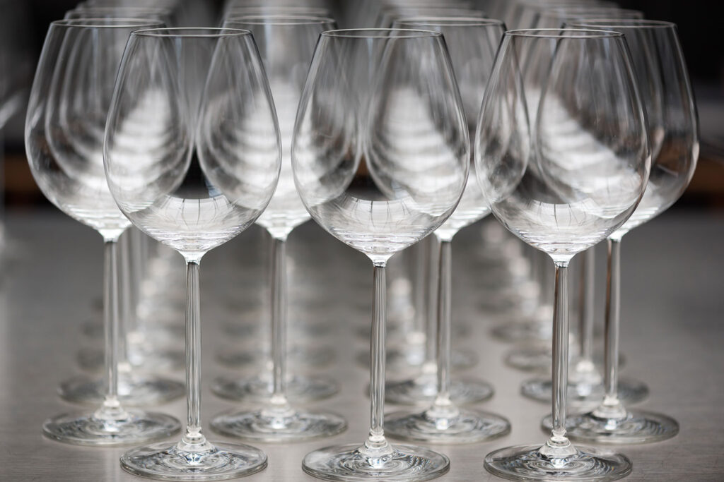 Stack of wine glasses to represent what causes alcoholic psychosis