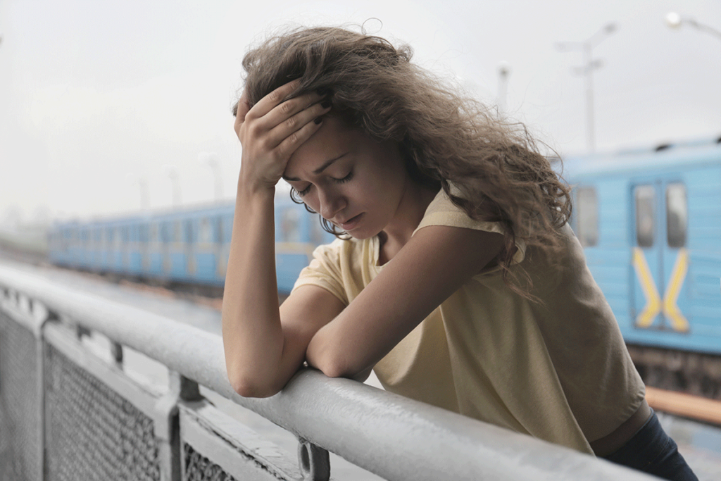 Person wondering if marijuana is a stimulant or depressant