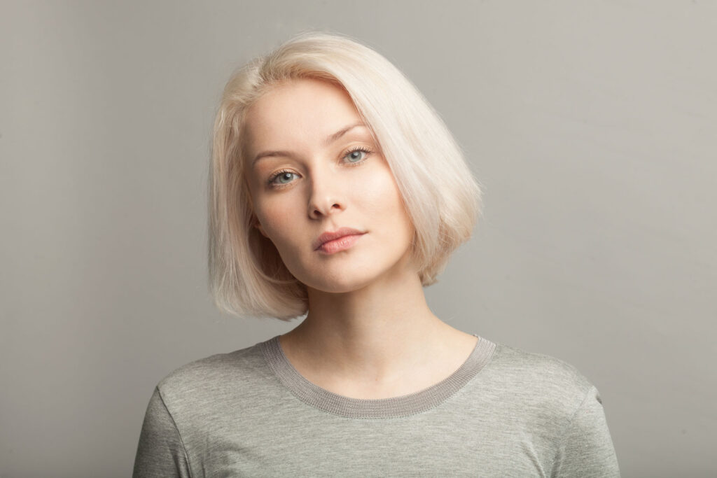 a woman struggling with benzodiazepine use disorder stares blankly into the camera