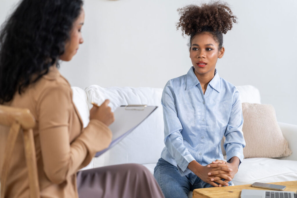 Two people talking about the benefits of outpatient treatment